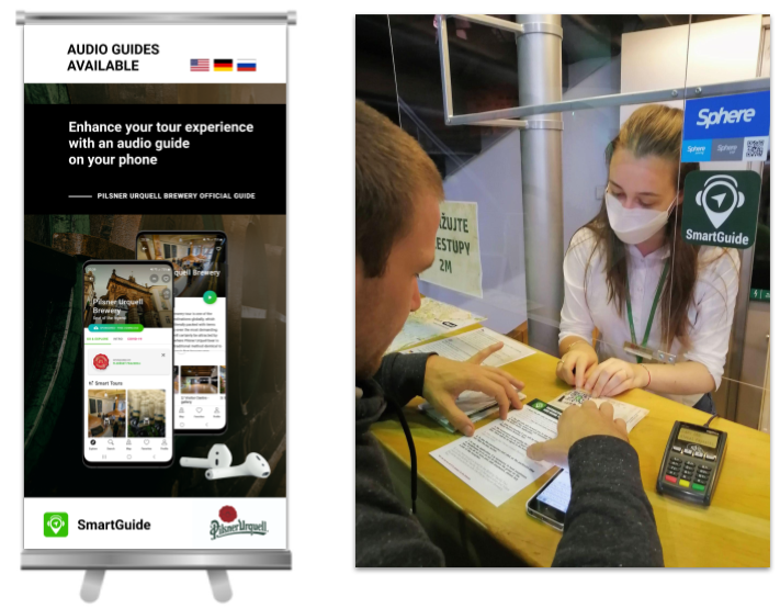 tourist information center telling about SmartGuide to visitor