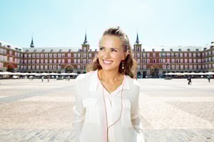 A girl enjoying a self-guided tour with an audio guide installed on her phone