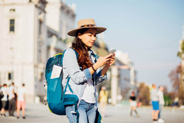 Tourist listening to self-guided tour app