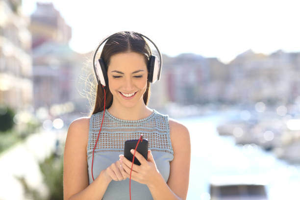 tourist listening to digital audio guide